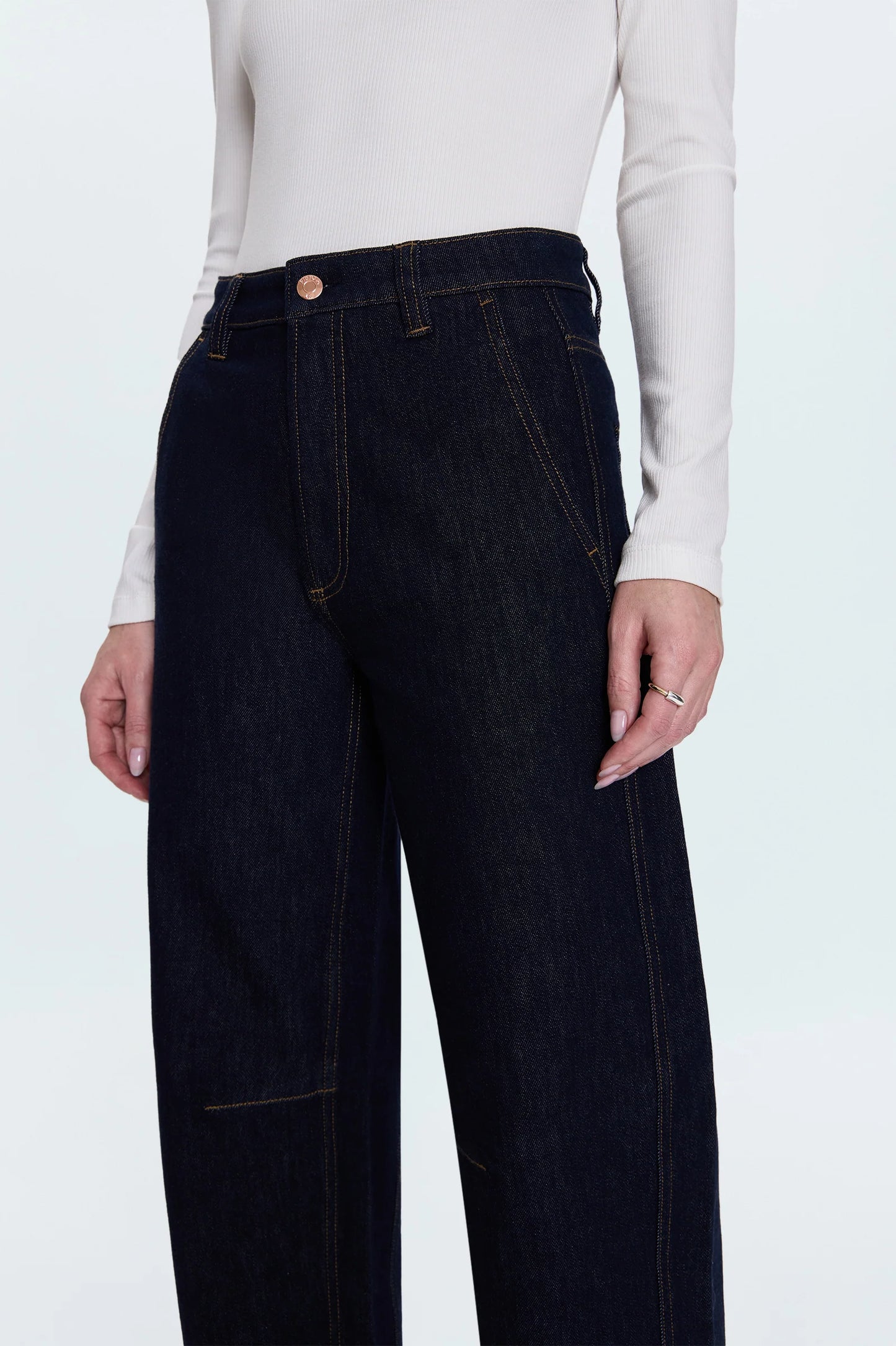 Beau seamed crescent raw jean