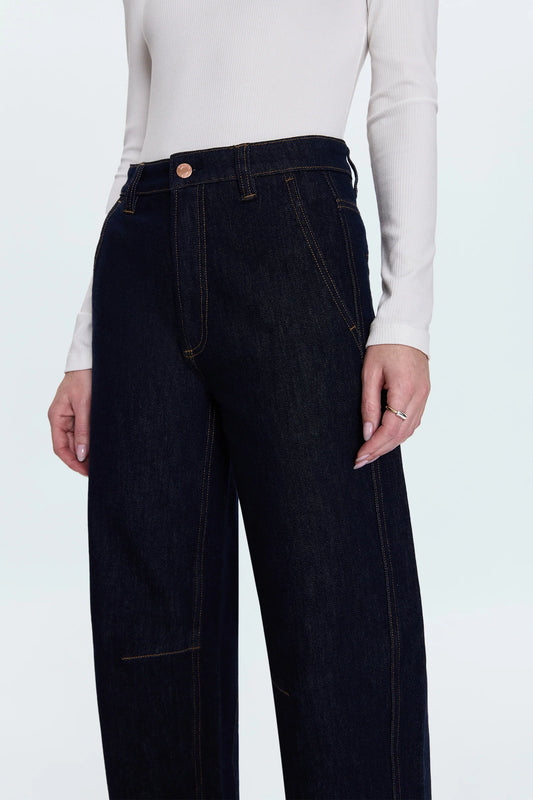 Beau seamed crescent raw jean