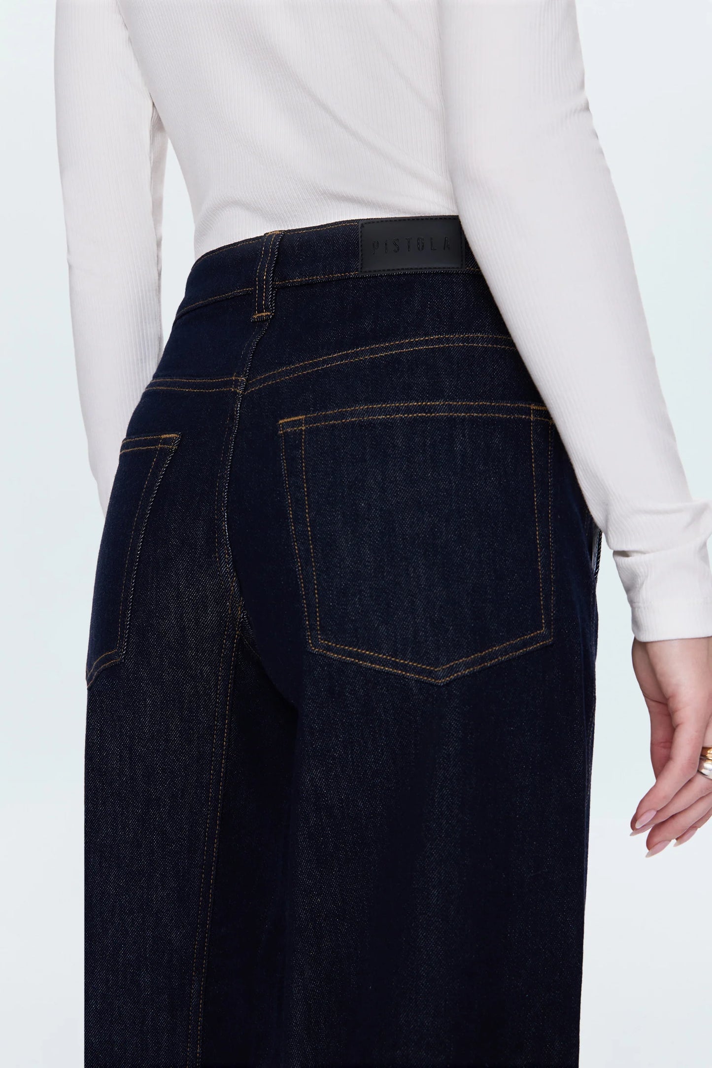 Beau seamed crescent raw jean